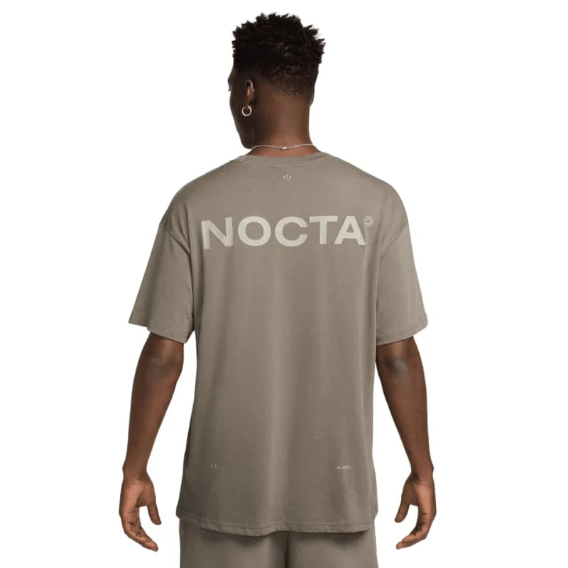 
                      
                        Nike x NOCTA NRG Big Body CS Tee - Taupe
                      
                    